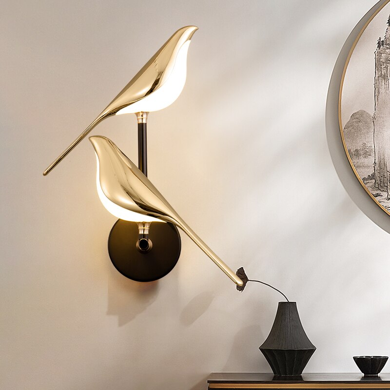 Goldene Vogel LED-Wandleuchte