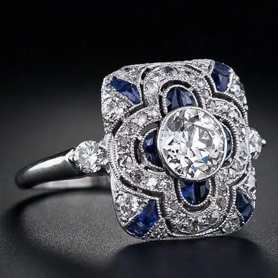 Eleganter Ring mit Blauem und Klarem Edelstein